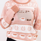Model wears the Pusheen Knit Sweater. The knit sweater features repeating patterns of white and brown star motifs on the top, middle, and sleeves of the sweater.