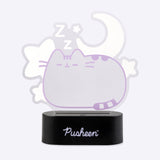 Dreams Lamp shown turned "off" in front of a white background to show the white and purple outline of the piece. 