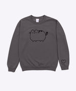 A charcoal grey sweatshirt with sleeves folded out to the side against a white background. The unisex sweatshirt has an embroidered graphic of a classic Pusheen the Cat on the center of the chest in black. The Pusheen sweatshirt also has a heart outline embroidered in black thread on the wearer’s left sleeve near the cuff. 