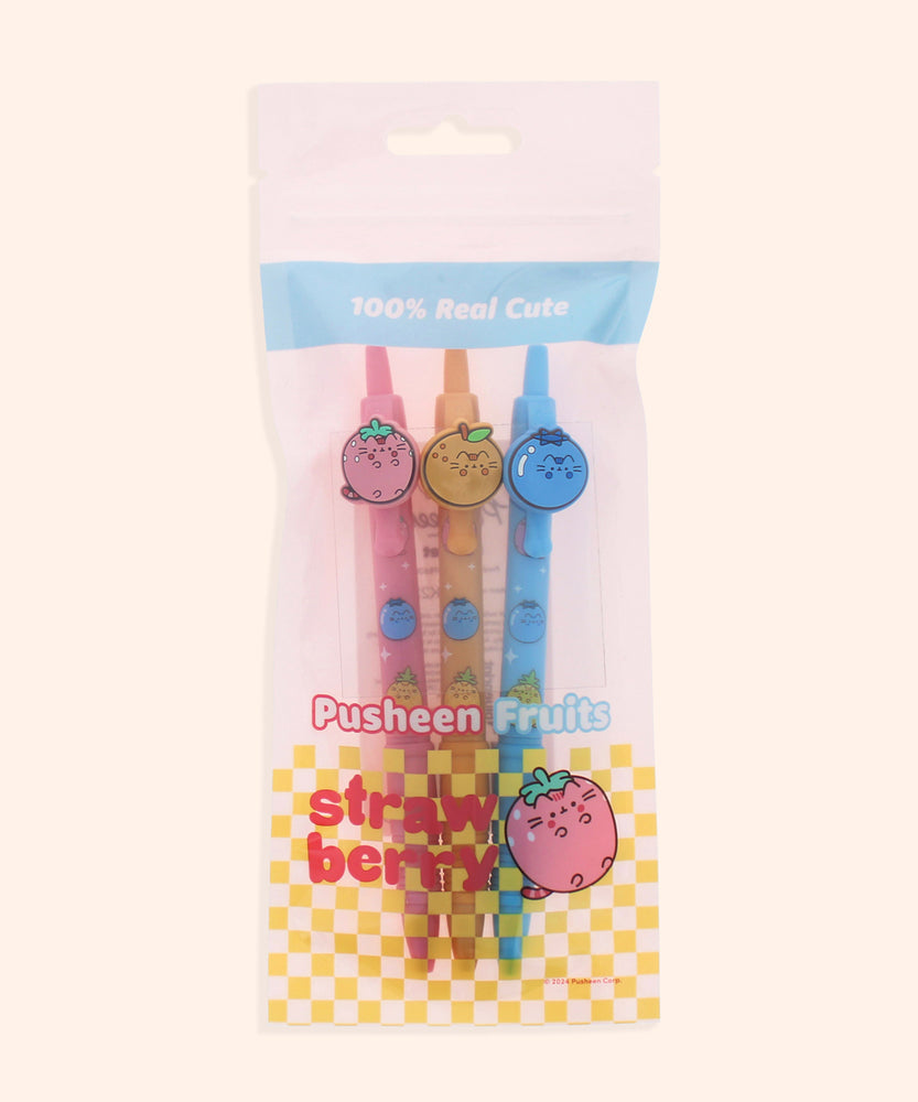 Pusheen Fruits 3-Pen Set in its resealable packaging bag. The pink and clear bag includes graphics of Pusheen Strawberry, yellow checkered print, and the phrase "100% Real Cute."