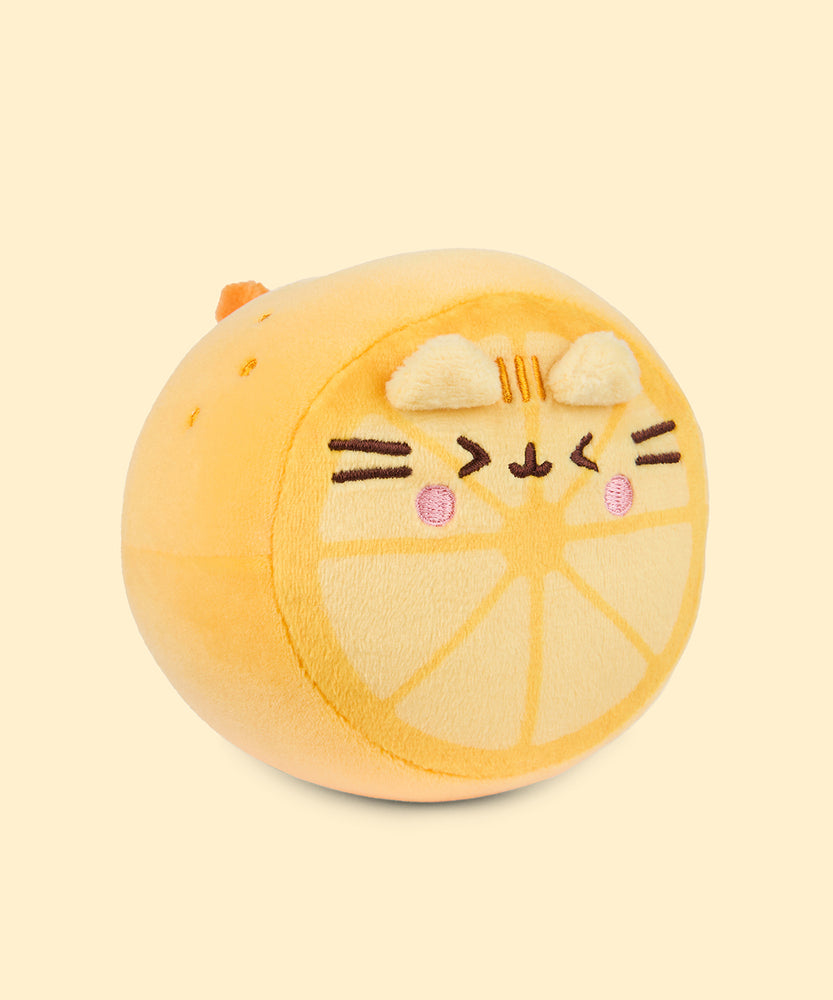    Right quarter view of the LemonP usheen Plush. In this angle, the dark yellow embroidered spots towards the back side of the small plush can be seen. 