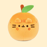 Front view of the Pusheen Fruits Orange Squisheen Plush. The orange plush stands 4” tall and has Pusheen the Cat’s facial features embroidered on the front of the round form in dark brown and dark orange. Coming off the top of the plush is a brown felt stem and green felt leaf. 