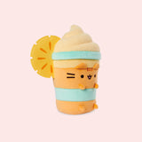 Right quarter view of the medium sized plush. The felt orange slice sits off the middle and top portion of the plush. Pusheen's ears and four paws extend off the body of the drink container portion of the plush.