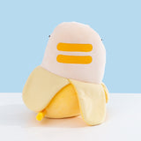 Back view of the Pusheen Banana Plush. Pusheen two back stripes are embroidered in darker yellow. Her tail comes out the bottom portion of the plush and is striped two-toned yellow.