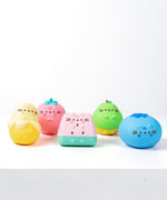 Front view of the five squishys in the Surprise Set. Each water-filled squishy show Pusheen taking the form of an adorable Fruit.