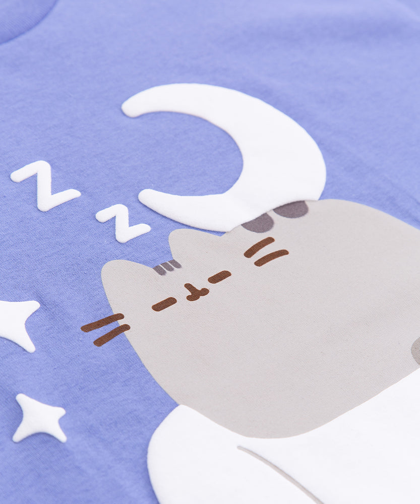 Close-up view of the puff print on the periwinkle tee. The white details surrounding Pusheen the Cat have the puff print effect on this Pusheen Good Night t-shirt. 