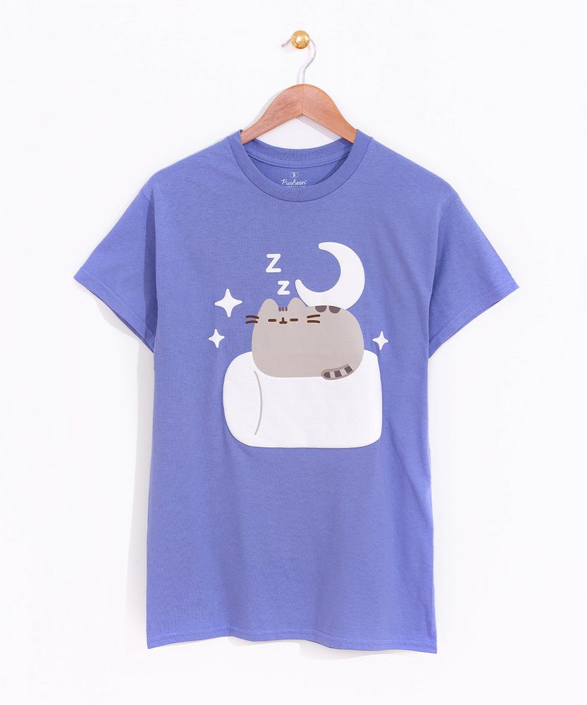 Front view of the Pusheen Good Night Unisex Tee. The light purple tee-shirt hangs on a light pink hanger in front of a white background. 