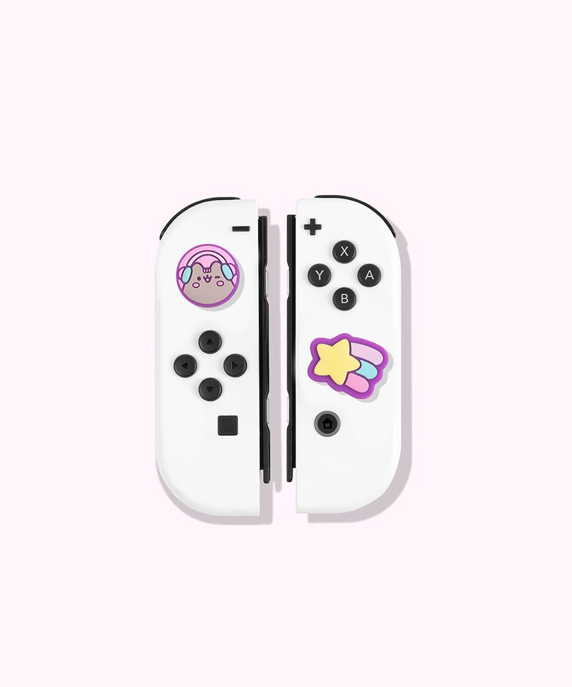 Pusheen wearing headphones and winking as a Nintendo Switch Thumb Grip on the left joy con. The grip cap on the right is a shooting star.