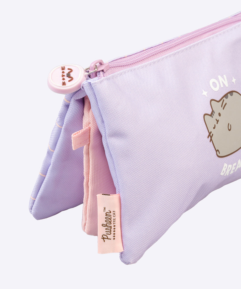 Back view of the Pusheen Bag. The light purple bag has a light pink grid pattern atop the light purple background.