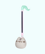 Full view of the Pusheen Otamatone. The top is mint green and resembles the top of a musical note. The pink stem leads into a gray rounded bottom.