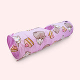 Purple Pusheen Pet Collapsible Tunnel with designs of Pusheen blushing with a whipped cream topping and a slice of strawberry cake.