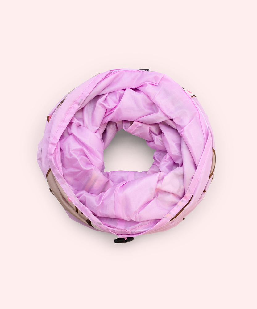 Collapsed view of the purple pet collapsible tunnel with Pusheen designs. 