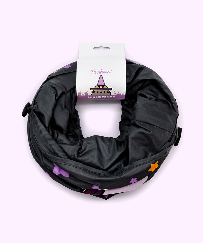 Back view of the Pusheen Bat Collapsible Tunnel in its packaging. The paper card that holds the foldable tunnel together shows an overview of the full graphic pattern on the tunnel, which includes two bats.