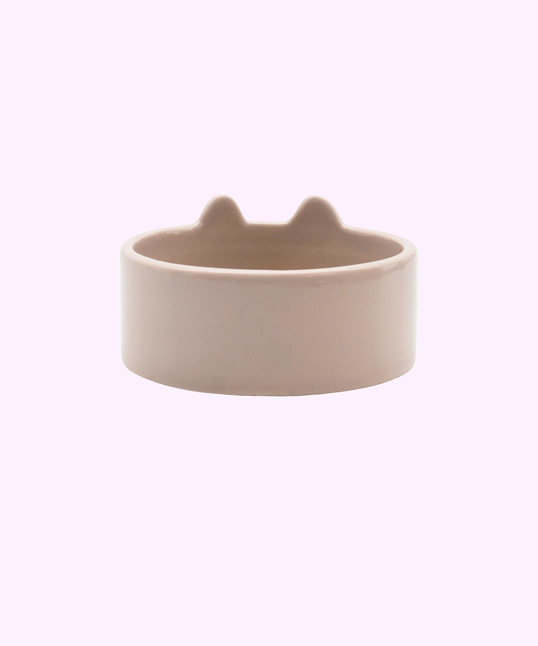 Back view of the light grey pet food and water bowl. The Pusheen Halloween Pet Bowl has a flat base and a circular shape with two rounded ears that extend from the top lip of the bowl.
