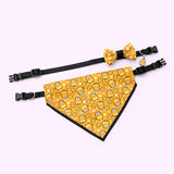 Pusheen pet Halloween-themed collar and bandana set laid out to show the length of the collars and the size of the printed bowtie and bandana. The set rests on a light purple background. 
