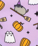 Pusheen Halloween pet collar and bandana set in packaging that states that the set are seasonal collars. The Boosheen charm and bandana pattern are displayed at the front. 