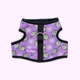 Front view of the Pusheen Pet Halloween Mummy Harness. The black and purple velcro harness has an all over print of spider weds and Pusheen as a mummy.