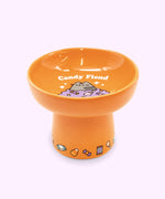 Alternate view of Halloween cat bowl. The bowl features a repeating pattern of candy on the base of the pedestal.