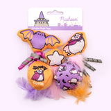 Halloween-themed pet plush toys on their packaging backer card. The card is purple and white and has the text "Pusheen" and "crinkle plush toys."