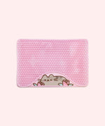 Pink textured litter mat with a design of a blushing Pusheen the Cat with two pink roses.