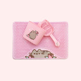 Components in the Pusheen Pet Litter Scoop and Mat Set. The Set includes a floor mat, scoop, and scoop holder. All three pink items have Pusheen designs with rose graphics.
