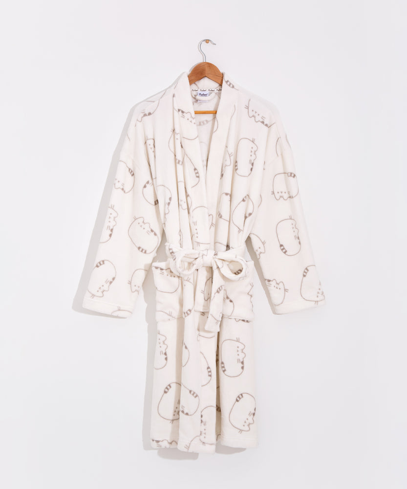 Cream plush robe with all over pattern of a gray outlined Pusheen the Cat lying down.