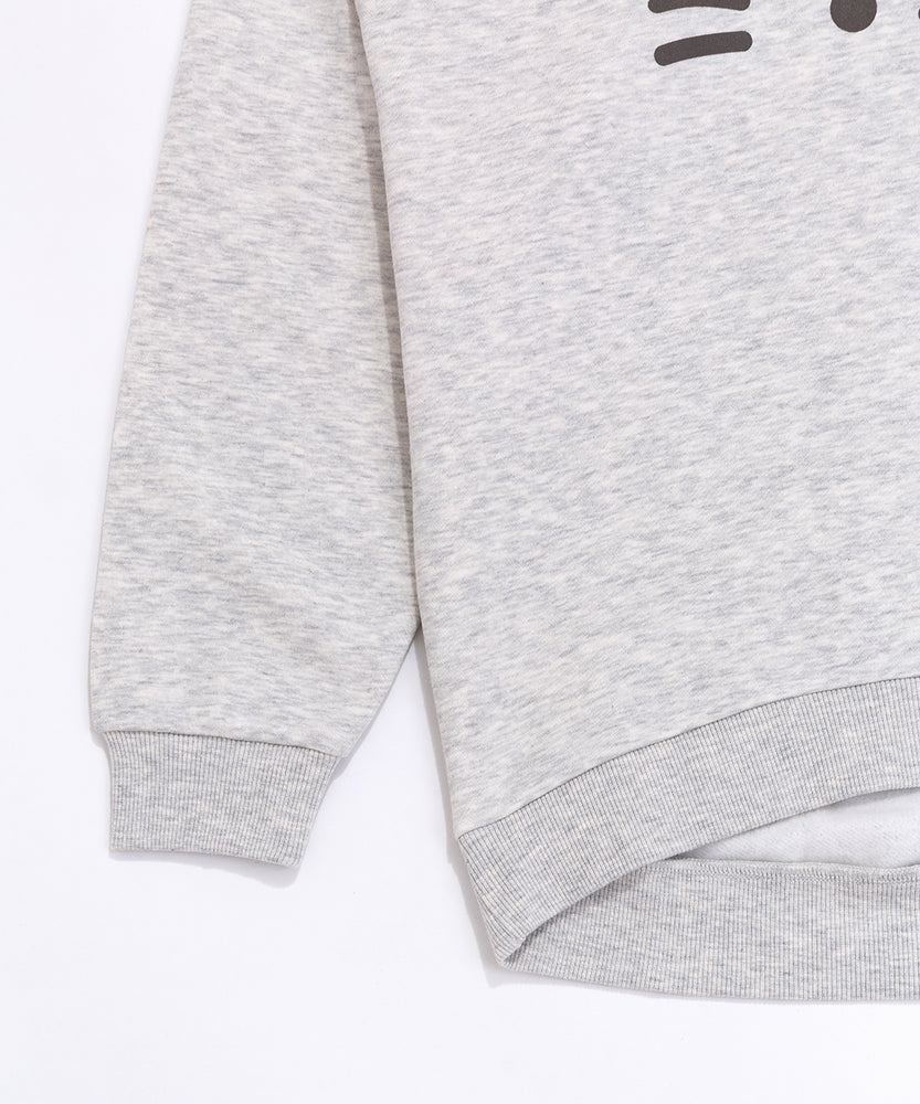 A close-up view of the cuff and hem of the Pusheen Sweatshirt. The light gray sweatshirt has tapered, ribbed detailing on the cuff and hem of the hoodie. 