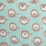 Close-up view of the pattern covering the Springtime Halter Dress. Pusheen, Stormy, and Pip are featured in their own individual portraits surrounded by flowers and tulips.