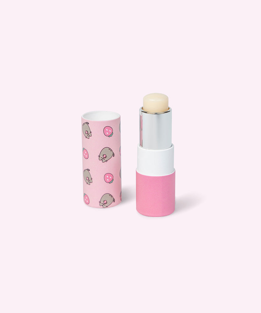 Unscented Pusheen lip balm has pink packaging with strawberry graphics. 