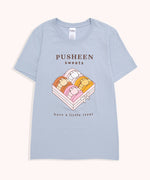 Blue t-shirt with a large graphic on the front center. The graphic shows Pusheen the Cat as four different types of macaron flavors placed in a box.