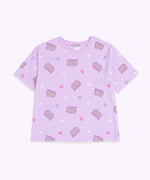 Pusheen Twilight Pajama Top lies on a flat surface. Pusheen the Cat has a grey body and is outlined in light purple and has light purple features.