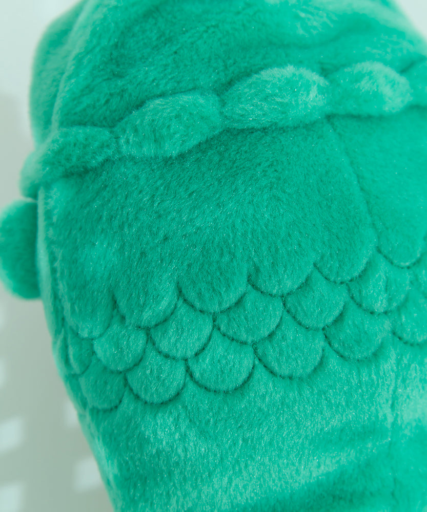 Close-up view of green scale details and fuzzy material of the Cat Snake Plush.