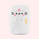 Front view of the Pusheen's Kitchen Refrigerator Plush. The white rectangular plush features Pusheen as a refrigerator with a yellow handle. Pusheen's blush and three head stripes are embroidered in a pink color while her eyes, mouth, and whiskers are embroidered in a dark brown color towards the top of the rectangular plush.