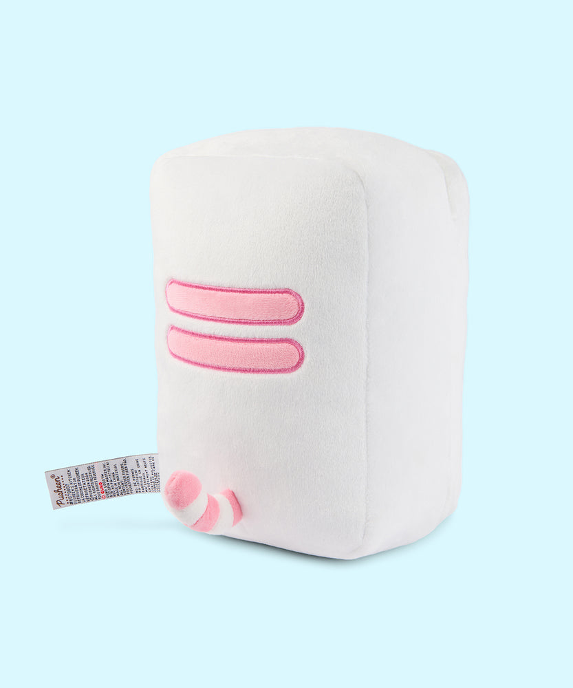 Side back view of the white rectangular plush. Pusheen's two back stripes are embroidered in a light pink color on the white plush.