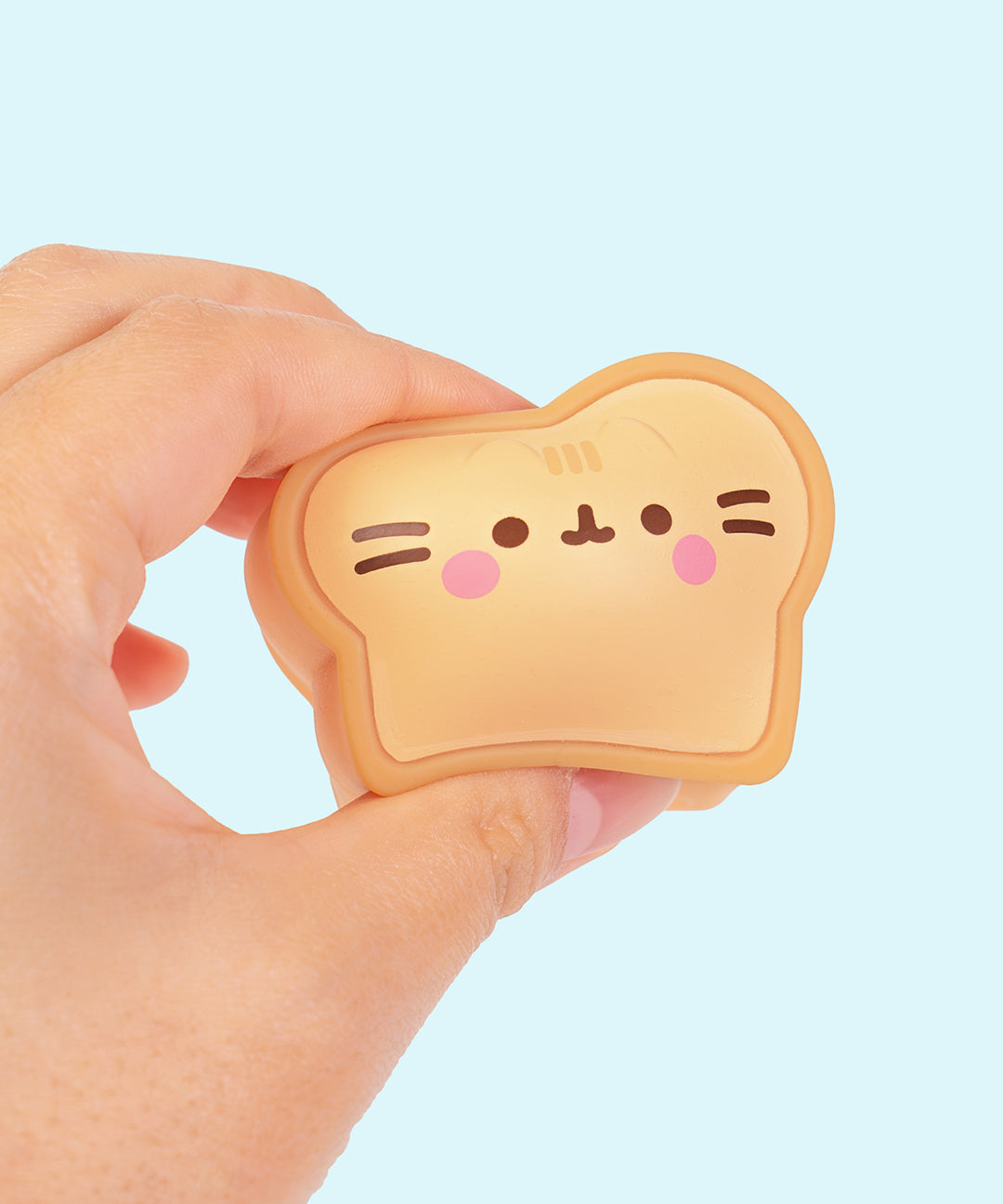 Model squishy the bread slice in the Kitchen Surprise Squishy. The water-filled squishy has a soft and squeezable texture.