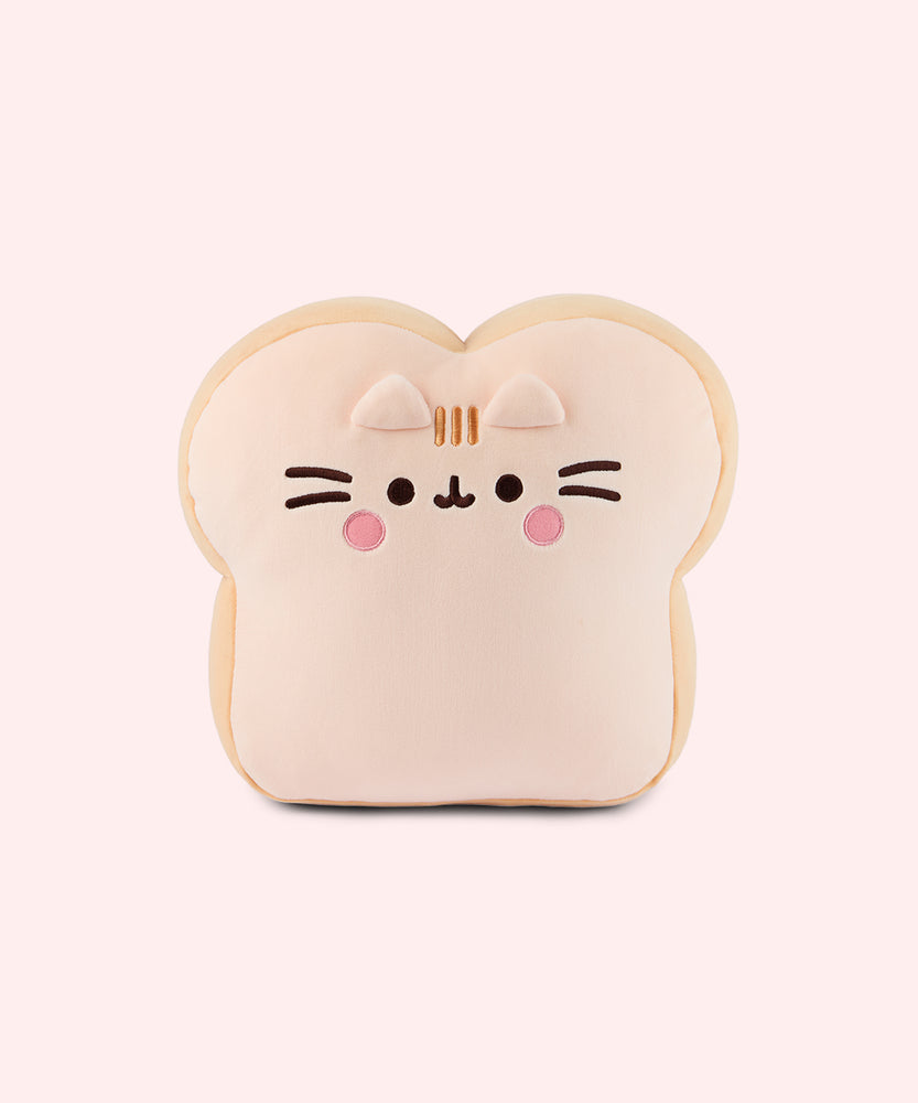 Front view of the Bread Plush. The edges of the plush are a light brown color while the front and back of the plush is a light cream color to mimic the look of a slice of white bread.