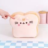 Model pokes the Pusheen's Kitchen White Bread Squisheen to show the squishy texture of the plush.