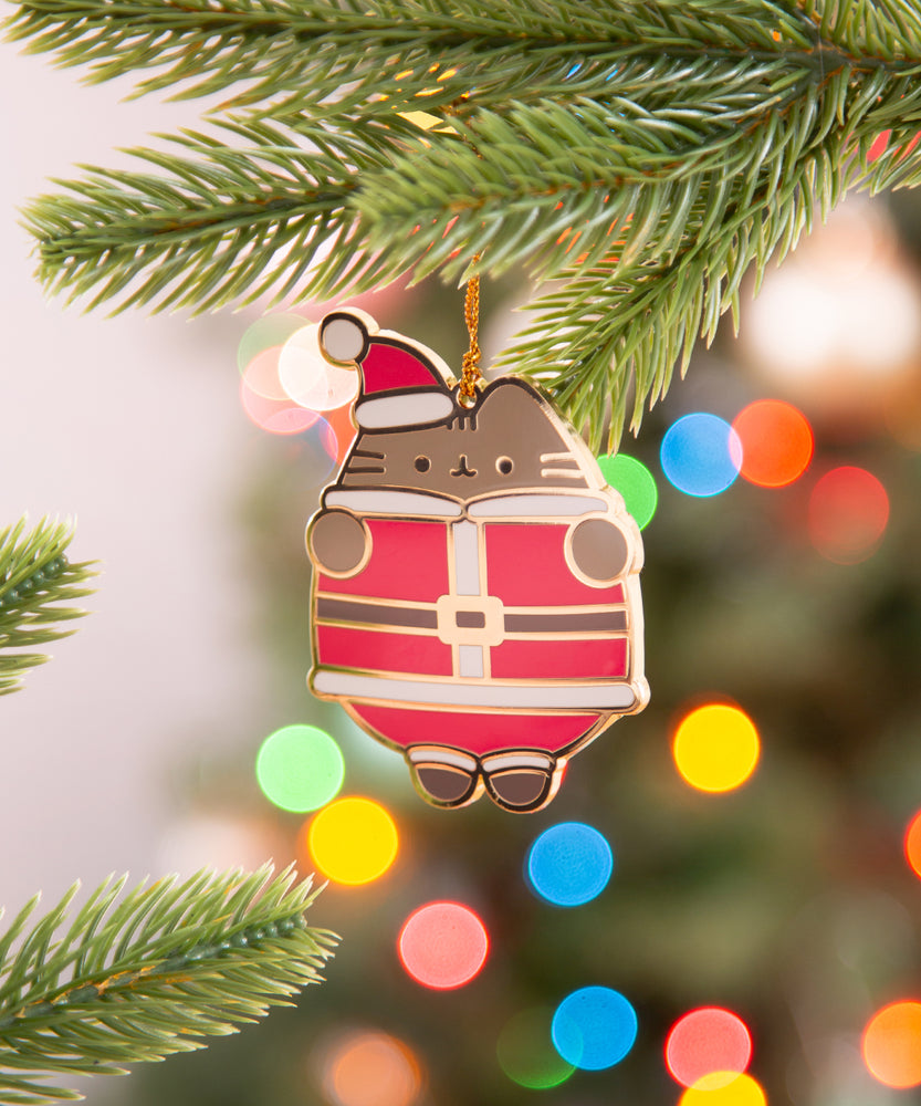 Santa Paws Ornament turned to the side to show the reflective gold outline that shines in the light.