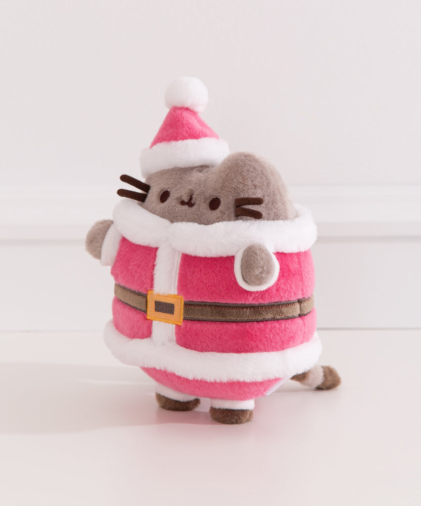 Front and side view of the Pusheen Santa Paws Plush. The Santa Claus costume has a red jacket lined with a white fur color and hem.