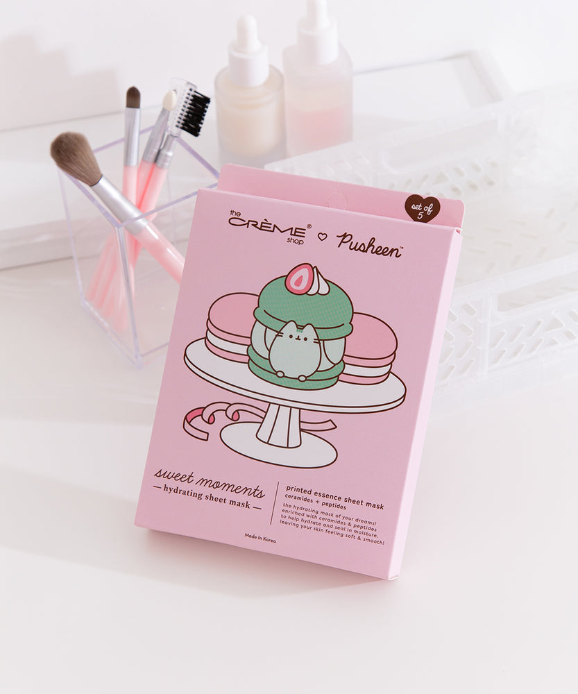 The Creme Shop x Pusheen Sweets Sheet Mask packaging. The text on the package has product details as well as a graphic of Pusheen the Cat inside a green match macaron.