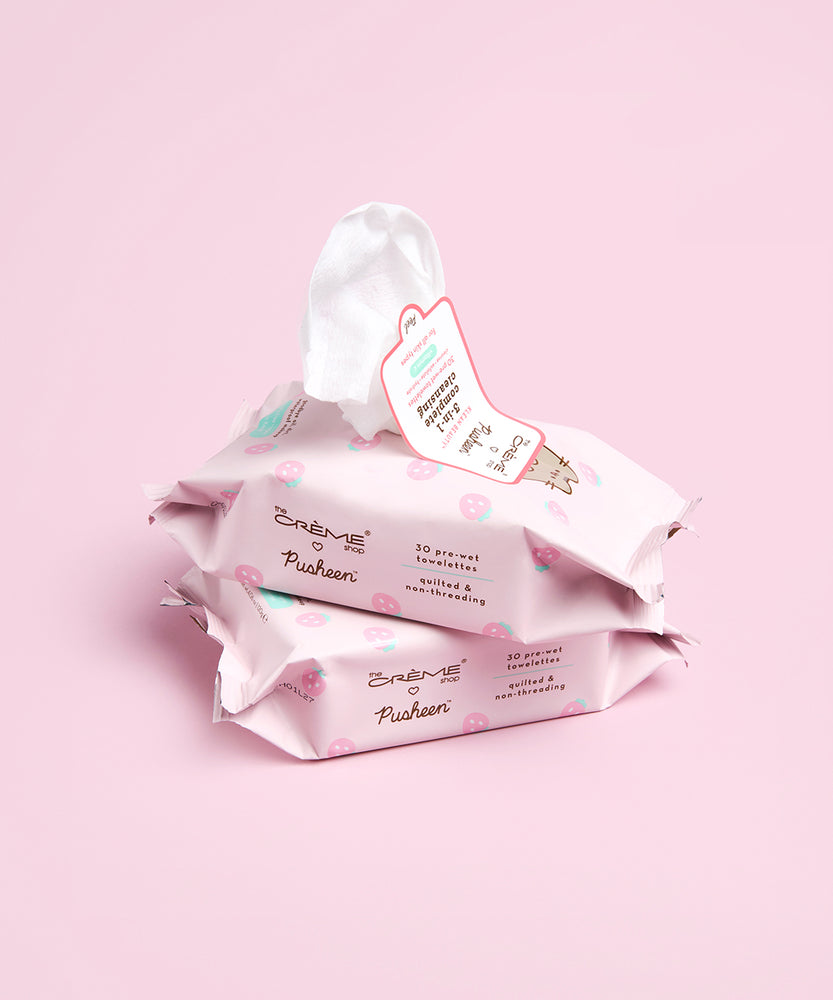 Side view of The Creme Shop x Pusheen Cleansing Towelettes - 2-pack. The light pink packaging has a resealable flap on the top for easy towelette extraction.