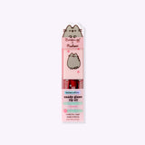 Berry Best Pusheen Lip Oil in its packaging. The front includes product details like the strawberry flavoring, and that the oil is vegan and cruelty-free.
