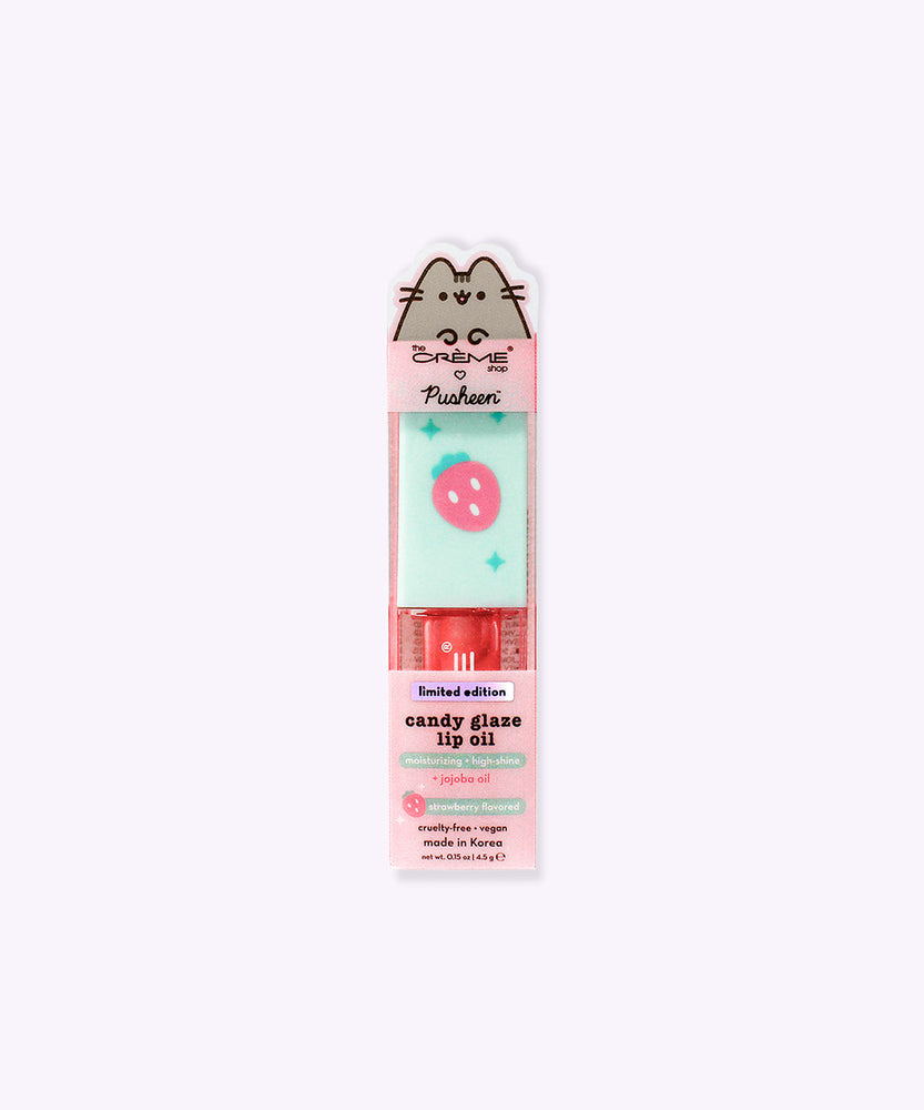 Twinkle Star Pusheen Lip Oil in its packaging. The front includes product details like the strawberry flavoring, and that the oil is vegan and cruelty-free.