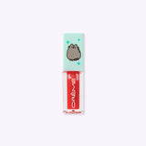 Front view of the Pusheen Lip Oil in Twinkle Star. The component has a mint green lid and a peachy oil color gloss.