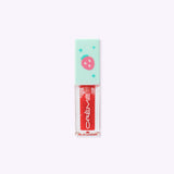 Back view of the Twinkle Star Pusheen Lip Oil. The mint green lid has a printed pink strawberry and green sparkles on the topper.