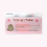 Back view of the packaging for the Pusheen Spa Headband. The back includes Pusheen logos and graphics as well as how to care for the item.