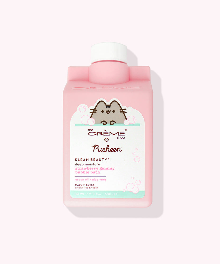Front view of the Bubble Bath packaging. The small rectangular bottle has a white pour top spout. The front packaging features a graphic of Pusheen the Cat surrounded by white and pink suds.