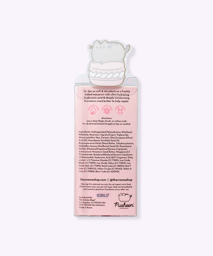 Back view of the packaging of the Pusheen Lip Balm. Printed on the back are directions for how to use the product as well as the ingredients in the product.