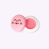 Interior view of The Crème Shop x Pusheen Strawberry Macaron Lip Balm. The lip balm is a light pink color that matches the top of the outer packaging.