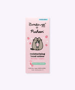 Front view of the Pusheen hand cream packaging. The light pink box has important product details such as the scent of the hand cream being strawberry milkshake scented.